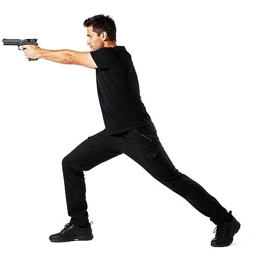 Dynamic Action Pose of Man Aiming Gun