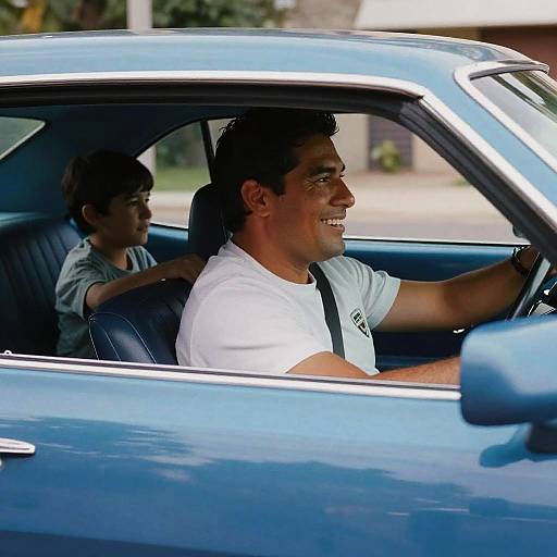 Happy Hispanic Brothers Driving Camaro