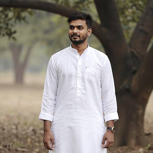 Man in Cotton Kurta by Tree