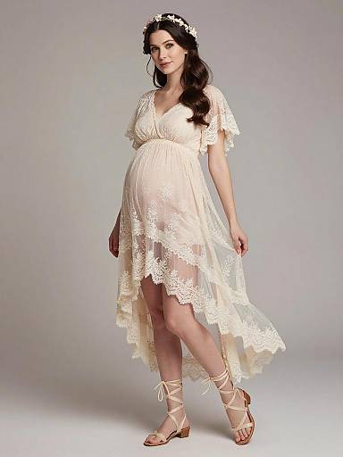 Elegant Pregnant Woman in Lace Maternity Dress