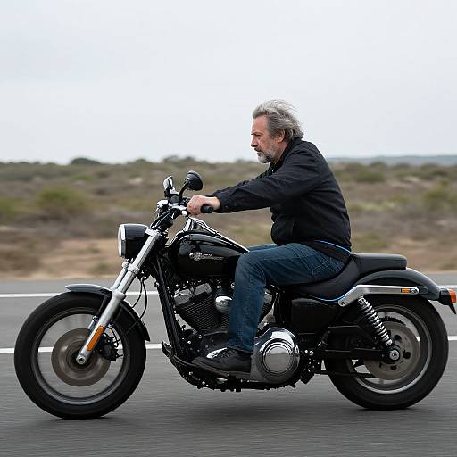 Grey-Haired Man on Ethernet-Wrapped Harley