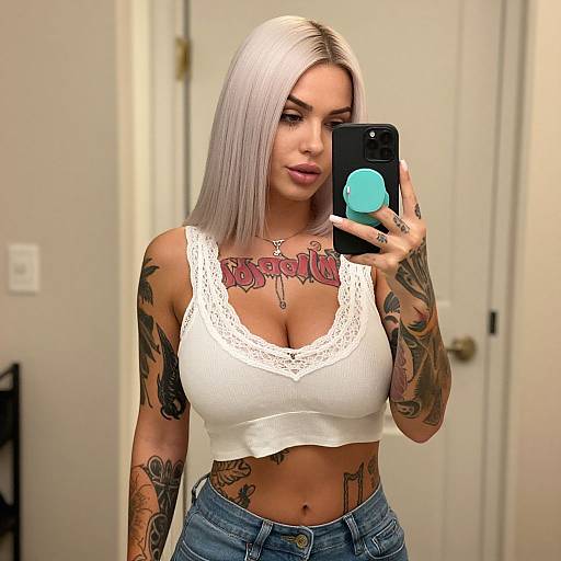 Blonde Woman Mirror Selfie Tattooed