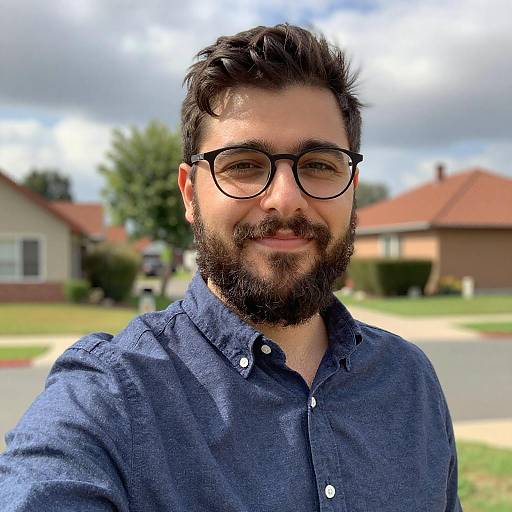 Smiling Bearded Man Taking Selfie Outdoors