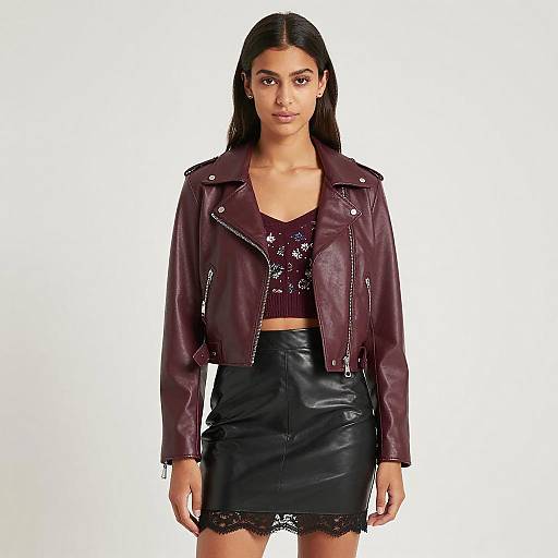 Chic Young Woman in Burgundy Biker Jacket