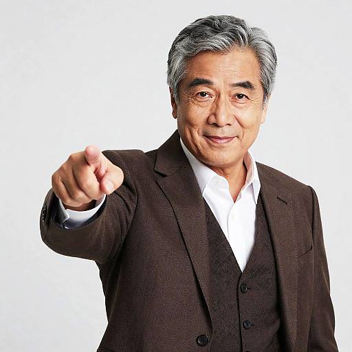Smiling Middle-Aged Man Pointing Forward