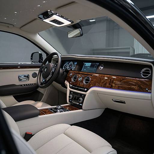 Photograph of a luxurious car interior featuring white leather seats, wooden dashboard accents, black steering wheel, digital instrument cluster, and modern infotainment system