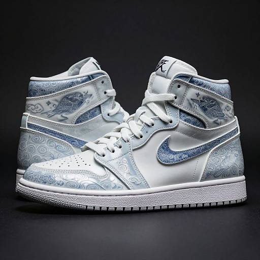 Photograph of white high-top sneakers with blue patterned accents, white laces, and Nike logo, set against a dark background.