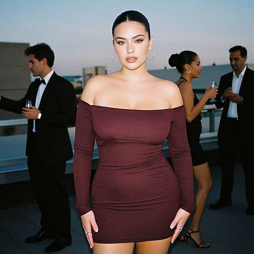 Photograph of a confident Asian woman with black hair in an off-shoulder, form-fitting maroon dress, standing on a rooftop at dusk
