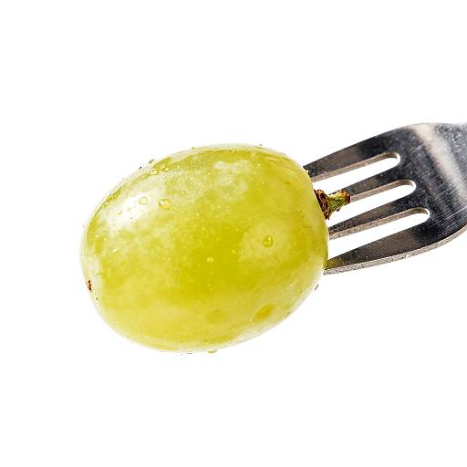 Close-Up of Grape on Fork