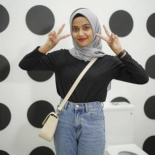 Young Woman Making Double Peace Sign