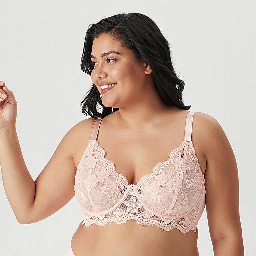 Plus-Sized Woman in Pale Pink Lingerie