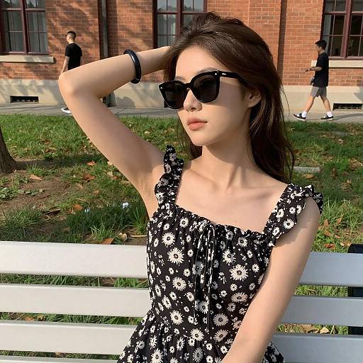 Sunlit Woman in Floral Dress