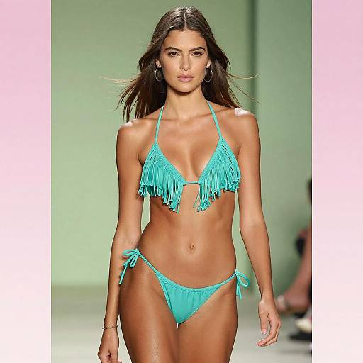 Model Wearing Turquoise Fringed Bikini on Runway