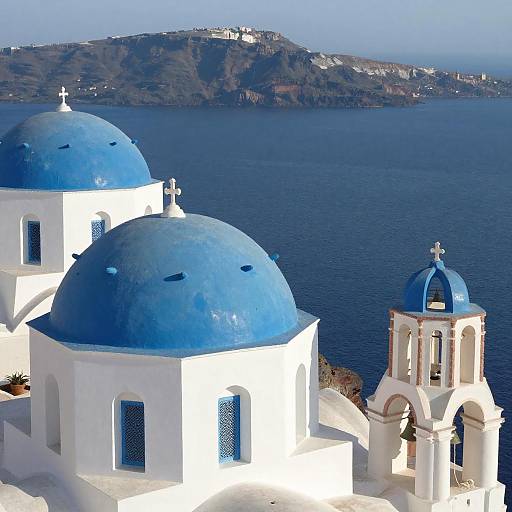 Sunlit Santorini with Iconic Blue Domes