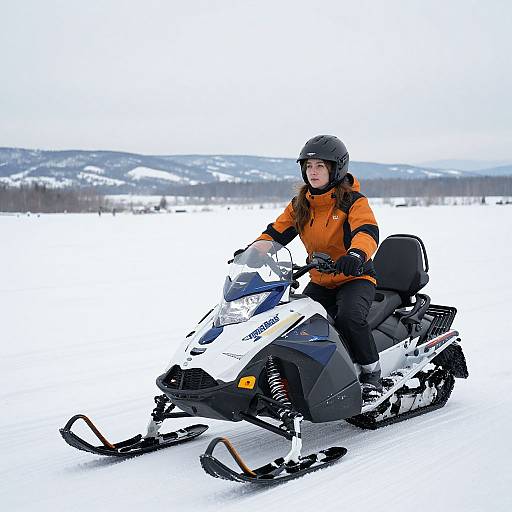 Woman on Snowmobile in Winter Landscape