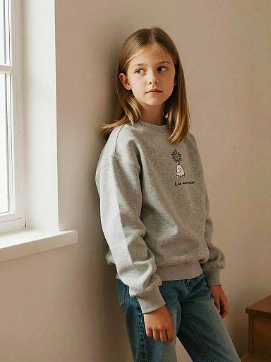 Thoughtful Girl in Cozy Minimalist Interior