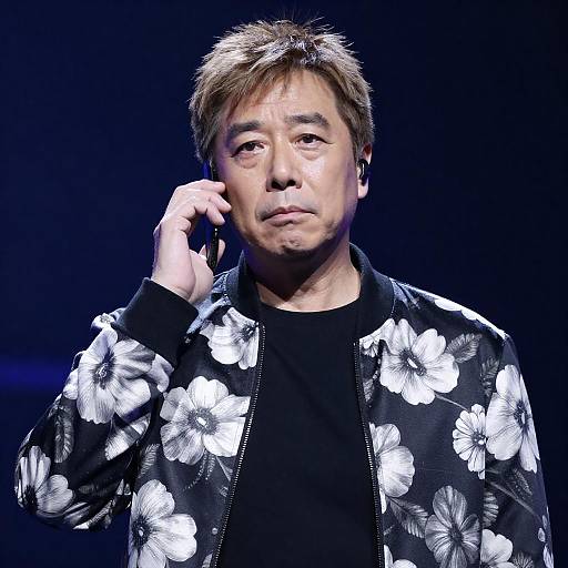 Serious Middle-Aged Man in Floral Jacket