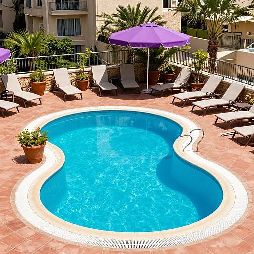 Serene Kidney-Shaped Pool at Inbal Hotel