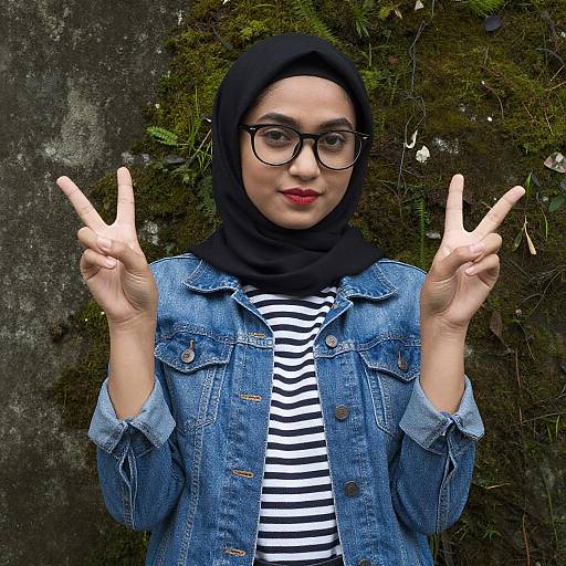 Young Woman in Hijab with Peace Signs