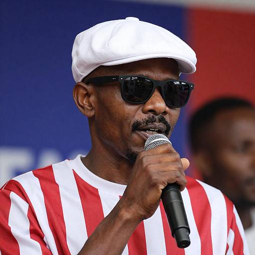 Stylish Man with Microphone in Focus