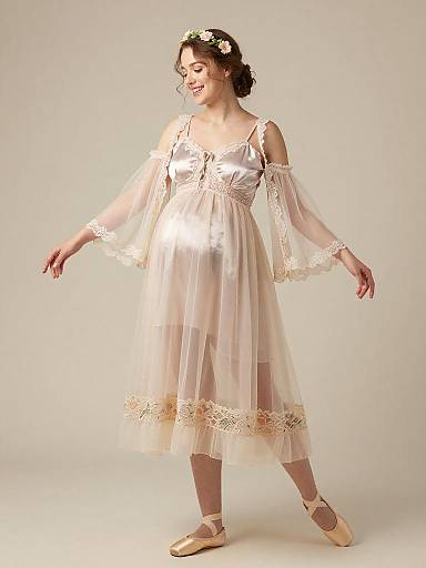 Playful Maternity Fairy Fashion Portrait