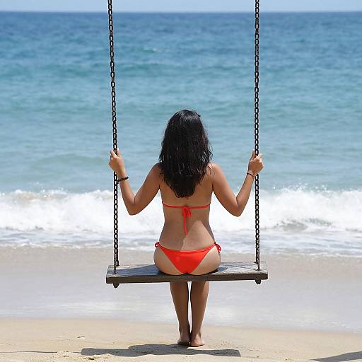 Solitary Woman on Swing by Ocean