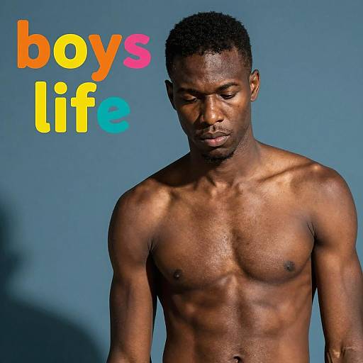 Shirtless Black Man with Boys Life Text