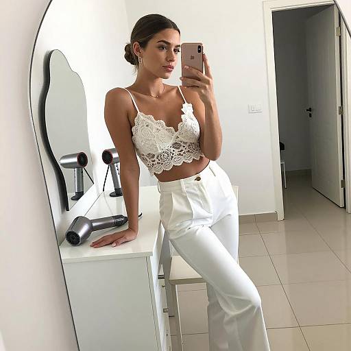 Woman in White Lace Crop Top Taking Mirror Selfie