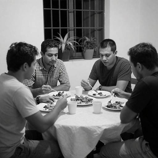 Black-and-White Friends Dining Around a Table