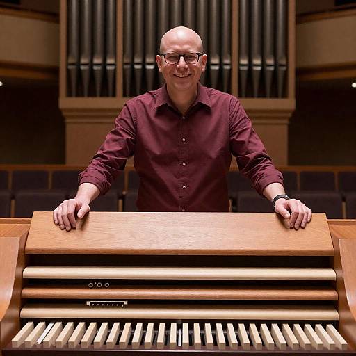 Smiling Bald Man by Pipe Organ