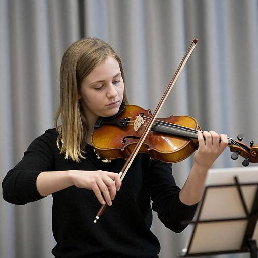 Young Woman Playing Violin in Soft Light