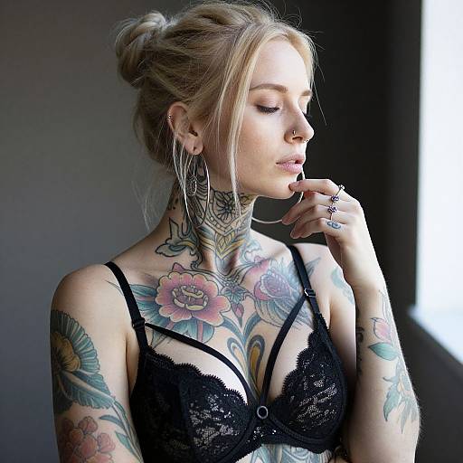 Tattooed Blonde Woman in Lace Lingerie