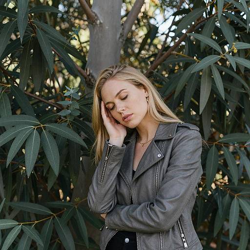 Contemplative Blonde Woman in Nature