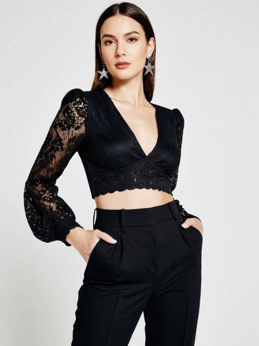 Chic Woman in Black Crop Top and Trousers