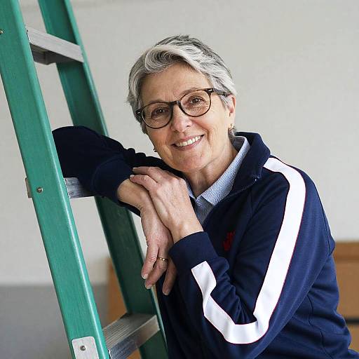 Smiling Middle-aged Woman Leaning on Ladder