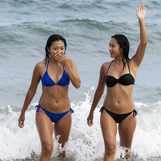 Playful Beach Day with Two Women
