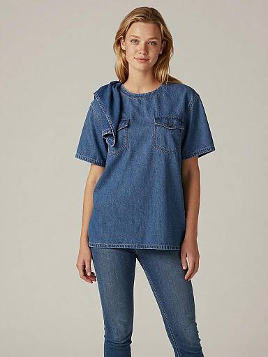 Woman in Oversized Denim Shirt and Jeans