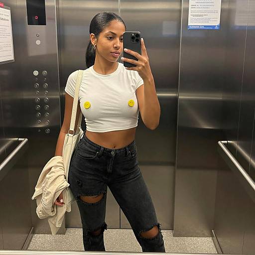 Chic Selfie in a Modern Elevator