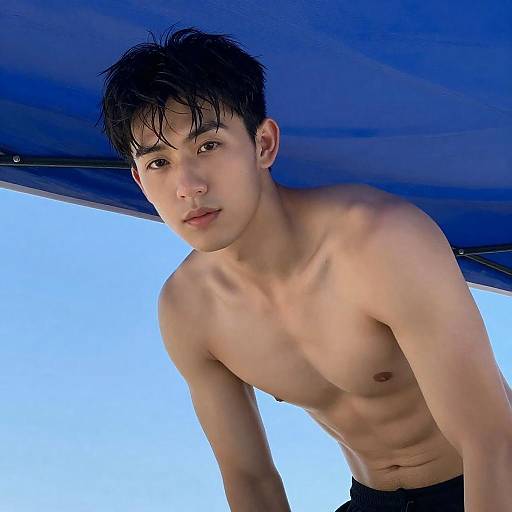 Shirtless Man Under Blue Tarp