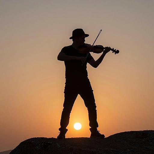 Violinist Silhouette at Sunset