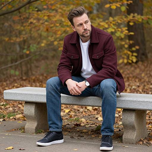 Man on Stone Bench in Autumn