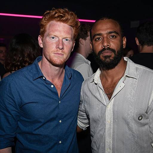 Intense Men in a Dimly Lit Club