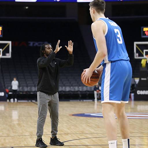 Dramatic Basketball Showdown in Dim Arena