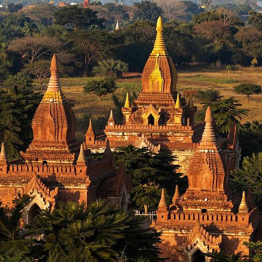 Ancient Golden Temple Complex with Spire-Topped Pagodas