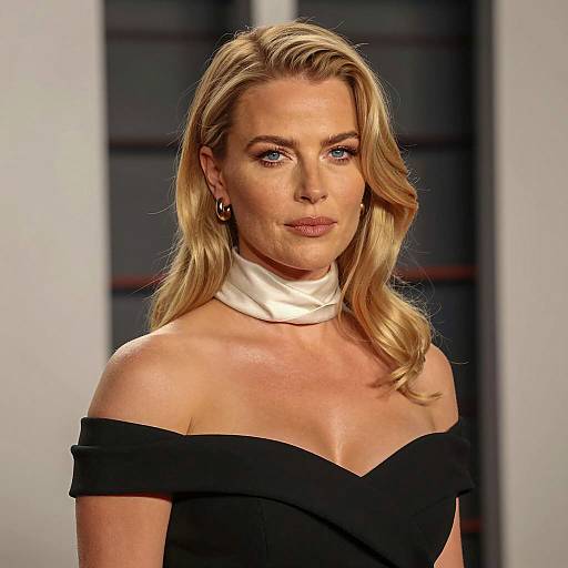 Elegant Blonde Woman in Black Dress