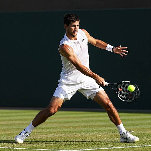 Agile Male Tennis Player Returning Smash