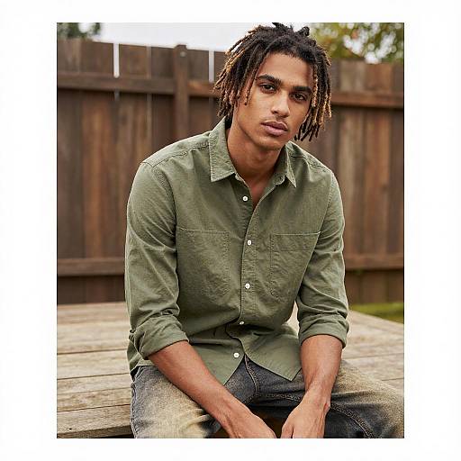 Young Man in Olive Green Shirt Outdoors