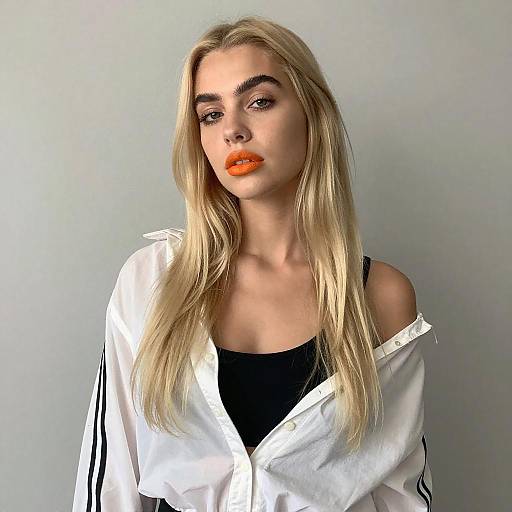 Blonde Woman in Stylish Off-Shoulder Jacket