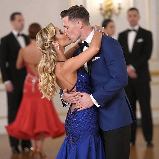 Blue-Suited Kiss at Elegant Ball