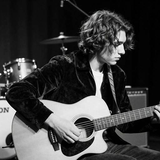 Young Man Playing Acoustic Guitar